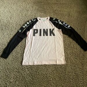 Ladies “PINK” long sleeve sequin accent top. Light pink w/black sleeves. Sz XS